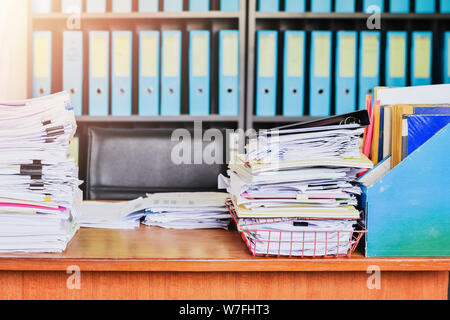 Heap of paperwork stack documents on office desk ,business documents billing and examination to report the summary results annual report for presented Stock Photo