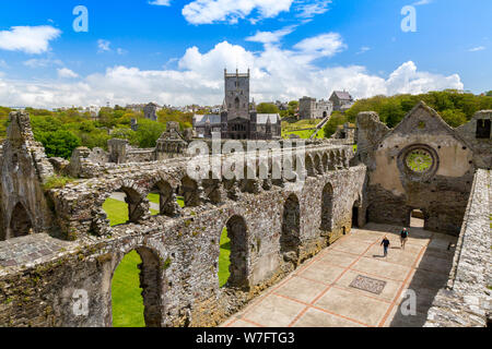 The Cathedral viewed from above the Great Hall with its arcaded parapets in the13th century Bishop's Palace, St Davids, Pembrokeshire, Wales, UK Stock Photo
