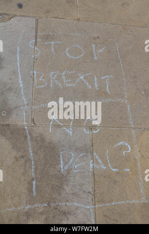 London UK. 5th August 2019.Stop Brexit No Deal written in chalk on the pavement outside the Cabinet Office in Whitehall as the government rules out further talks with the EU promising to leave on 31 October 2019 .Credit : amer ghazzal/Alamy Live News Stock Photo