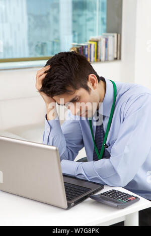 Businessman looking sad Stock Photo