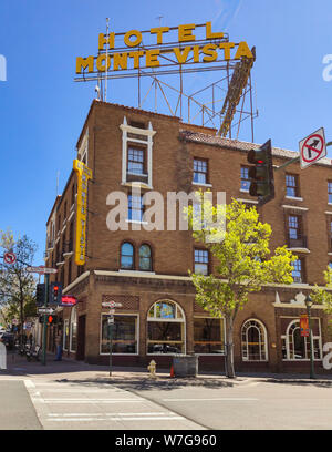 Flagstaff Arizona, USA, May 25 2019. Monte Vista hotel old fashioned building facade with red bricks, clear blue sky background. U.S. Route 66. Stock Photo