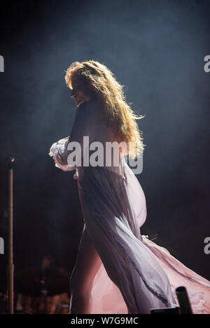 BONTIDA, ROMANIA - JULY 19, 2019: Singer of Florence and the Machine English indie rock band singing live on the stage during a concert at Electric Ca Stock Photo