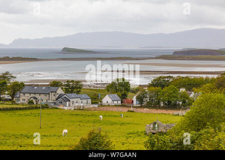 View from the trail up Irelands Holy Mountain Croagh Patrick in the village of  Murrisk in County Mayo Ireland Stock Photo