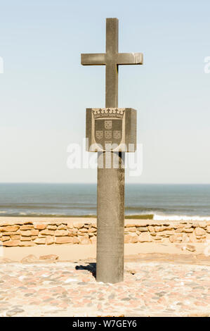 Stone Portuguese cross at Cape Cross, Namibia.  The original cross was taken by Germany and only agreed to be returned in 2019. Stock Photo