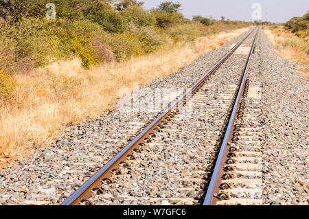 Railway track with concrete sleepers in Namibia Stock Photo