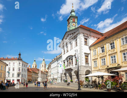 People visitors and tourists in Ljubljana Town Square in front of the Ljubljana Town Hall Stritarjeva ulica Old Town Ljubljana Slovenia Eu Europe Stock Photo