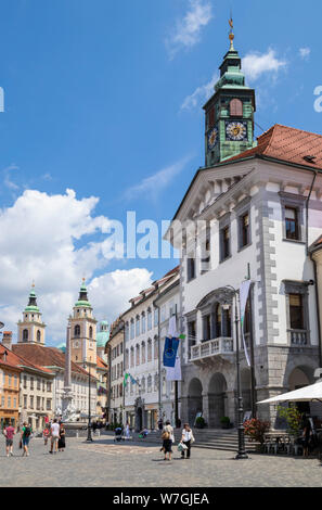 People visitors and tourists in Ljubljana Town Square in front of the Ljubljana Town Hall Stritarjeva ulica Old Town Ljubljana Slovenia Eu Europe Stock Photo