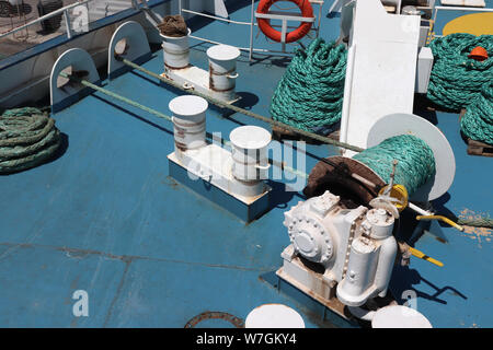 Winch gear on the deck of a ship Stock Photo