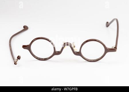 Vintage round glasses isolated on white background. Stock Photo