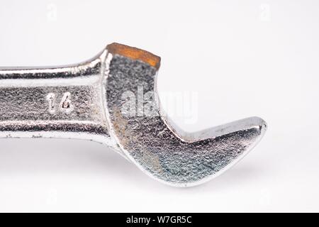 Close-up broken wrench isolated on white background Stock Photo