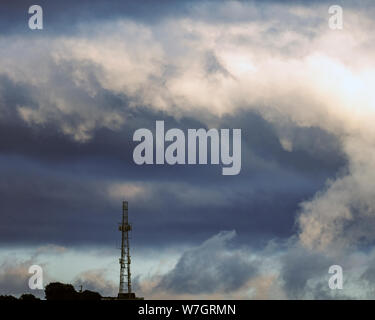 A Telephone Mast with a dramatic sky in the background, East Lothian, Scotland, UK. Stock Photo
