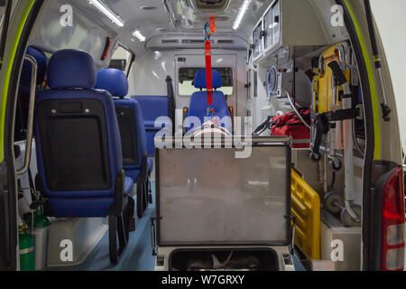 Interior of an ambulance with bed and patient care equipment Stock Photo