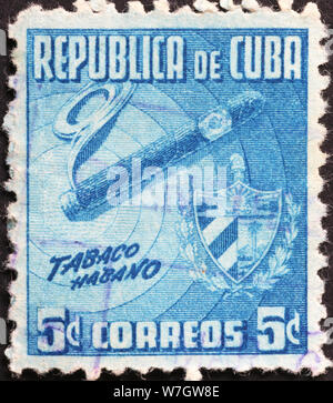 Cigar on old cuban postage stamp Stock Photo