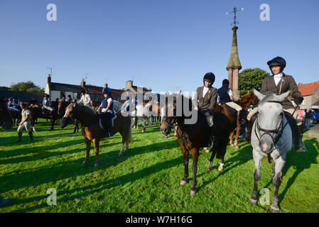 The Coldstreamer's cavalcade at Norham during Coldstream Civic Week 2019, this years annual visit saw 99 horses make the journey. Stock Photo