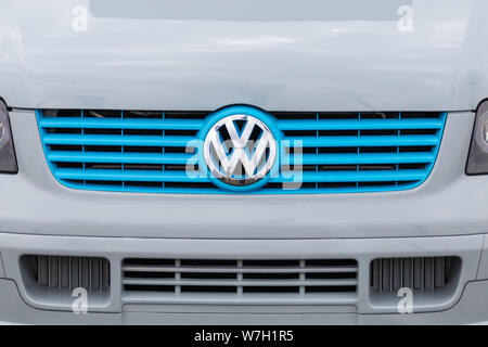 08/04/2019 Portsmouth, Hampshire, UK a close up of the blue front grill on a Volswagen camper van showing a VW badge Stock Photo