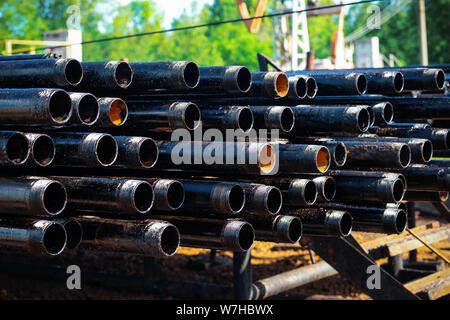 Close up drill pipe thread with pipe dope grease lay down on rig floor at oil and gas on shore location Stock Photo