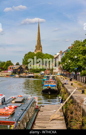 The church of St Mary Redcliffe from the floating harbour, Redcliffe, Bristol, UK. July 2019. Stock Photo