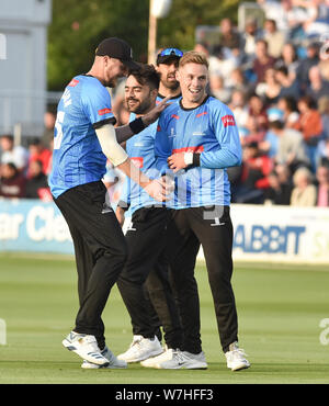 Hove Sussex UK 6th August 2019 - Phil Salt (right) of Sussex Sharks takes a great catch to dismiss Jeremy Lawlor of Glamorgan off the bowling of Rashid Khan during the Vitality T20 Blast cricket match between Sussex Sharks and Glamorgan at the 1st Central County ground in Hove Credit : Simon Dack / Alamy Live News Stock Photo