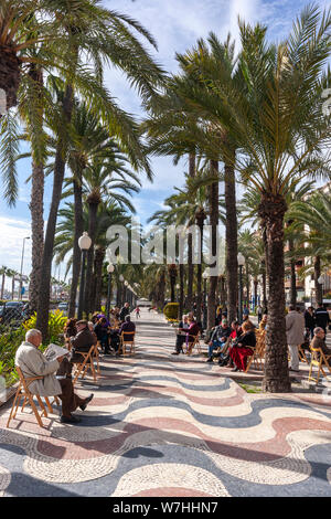 The promenade Explanada de España, lined by palm trees, is paved with 6.5 million marble floor tiles , Alicante, Valencia Comunidad, Spain Stock Photo