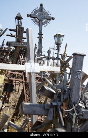 Hill of crosses or Kryziu kalnas in Siauliai, Lithuania. Famous site of catholic pilgrimage. A large number of wooden crosses, crucifixes and religiou Stock Photo