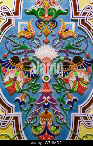 Texture of ceramic tiles in oriental East style. Turkish ceramic tiles lined on the wall. Old pattern floral ornament on tiles. Ottoman traditional ar Stock Photo