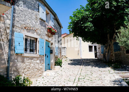 One of the narrow back streets in the historic old town of Rovinj in Croatia Stock Photo