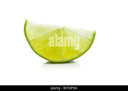 The green sliced lime isolated on white background. Stock Photo