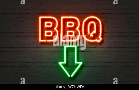 BBQ neon sign on brick wall background Stock Photo