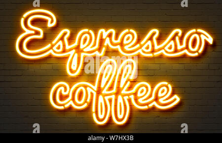Espresso coffee neon sign on brick wall background Stock Photo