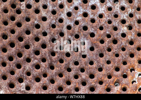 Rusty Perforated Metal Surface Stock Photo