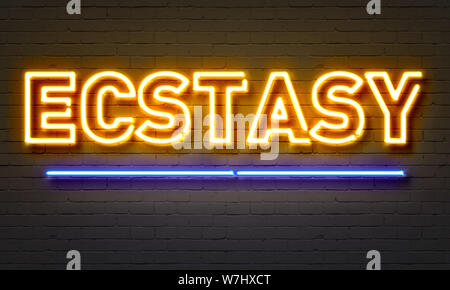 Ecstasy neon sign on brick wall background Stock Photo