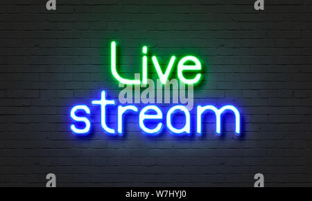 Live stream neon sign on brick wall background Stock Photo