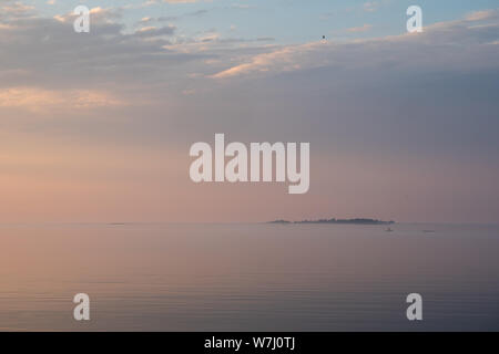 quiet mood on the sea with island Stock Photo