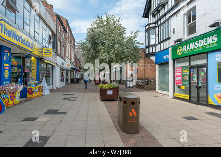 Retail outlets line the edge of George Street in Altrincham town centre, Cheshire, UK. Stock Photo