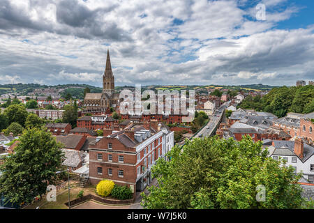 The city of Exeter skyline looking towards the City Gate Hotel and Iron Bridge with St Michael and All Angels Church on the left. Stock Photo