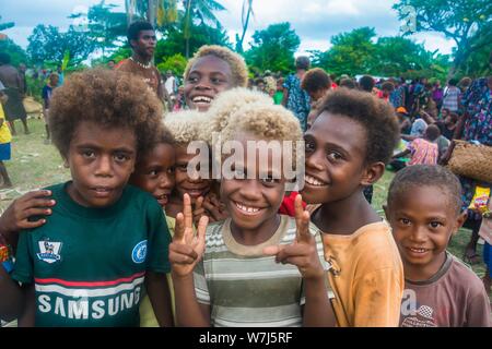 Group of happy children, young boys with blond hair, East New Britain Province, Papua New Guinea Stock Photo