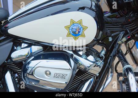 Logo of the California Highway Patrol on a tank of a Harley-Davidson Road King Police FLHP, Berlin, Germany Stock Photo