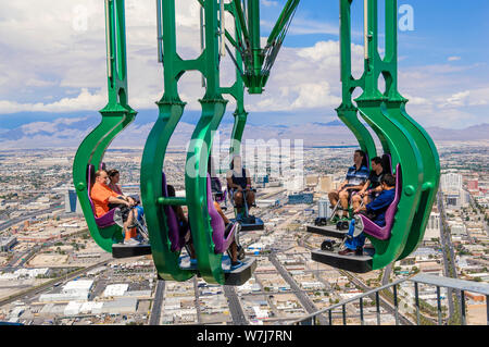 Tourists on the Insanity Thrill ride at the top of the Stratosphere Hotel, Las Vegas Stock Photo