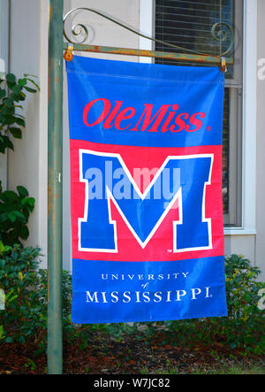 Close up of An 'Ole Miss' banner hanging outside a building on an ornate frame, a fan of the University of Mississippi, Oxford, MS Stock Photo