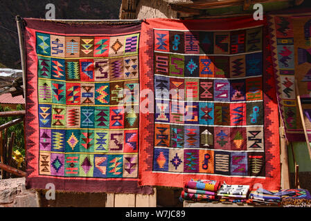 Alpaca scarves, shawls and clothing, tourist souvenirs, Pisac, Peru Stock Photo