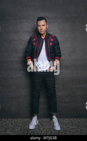 Hong Kong actor Donnie Yen, also known as Yen Chi Tan, poses for portrait photos during an exclusive interview by Imaginechina in Beijing, China, 20 S Stock Photo