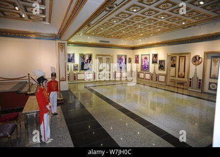 Chinese employees dressed in royal palace servant costumes pose in a replica of the 'Palace of Versailles', a Baroque art museum turned from a factory Stock Photo