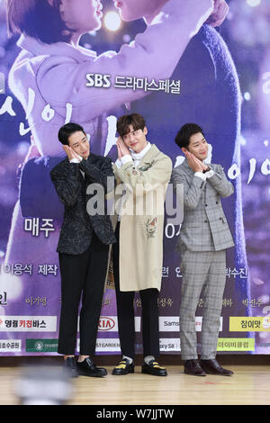 (From left) South Korean actors Jung Hae-in, Lee Jong-suk and Lee Sang-Yeop attend a press conference for their new TV drama 'While You Were Sleeping' Stock Photo