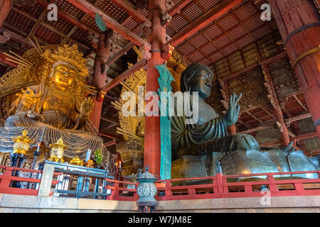 Nara, Japan - October 29 2018: Daibutsu - the great Buddha with Kokuzo Bosatsu - Chinese Goddess in Daibutsuden, the great Buddha hall at Todaiji temp Stock Photo