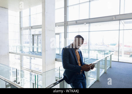 Businessman using tablet computer at work Stock Photo