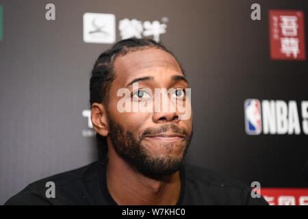NBA star Kawhi Leonard of San Antonio Spurs receives an interview at a basketball event held by Jordan Brand during his China tour in Beijing, China, Stock Photo