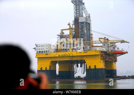 The ultra-deep-water semi-submersible drilling rig 'Blue Whale II', which can mine both combustible ice and oil, is pictured at a harbour in Yantai ci Stock Photo