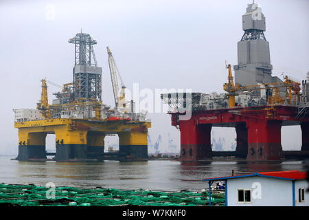 The ultra-deep-water semi-submersible drilling rig 'Blue Whale II', which can mine both combustible ice and oil, is pictured at a harbour in Yantai ci Stock Photo