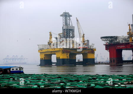 The ultra-deep-water semi-submersible drilling rig 'Blue Whale II', which can mine both combustible ice and oil, is pictured at a harbour in Yantai ci Stock Photo