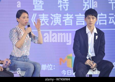 Chinese actress Zhou Xun, left, and actor Liu Haoran attend a launching event of a TV show in Beijing, China, 8 August 2017. Stock Photo